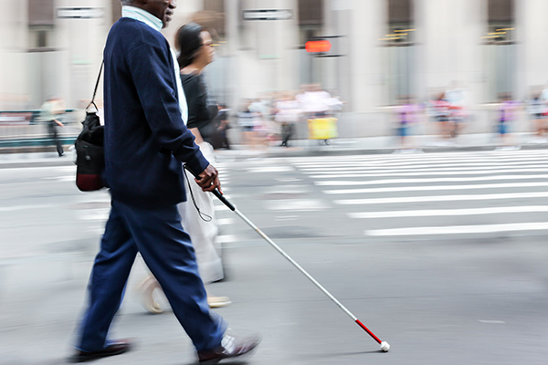 Blind person walking