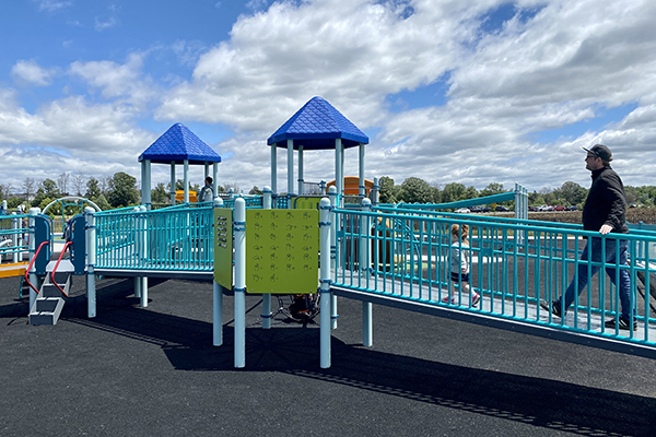 Playground equipment with ramp